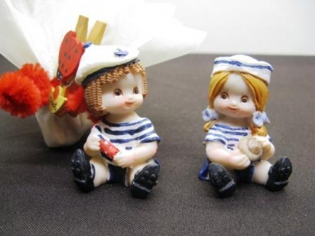 Sujet en résine fille marin en promotion pour baptême : Sujet en résine fille marin en promotion pour baptême