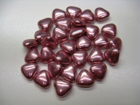 Dragées rose vieilli au chocolat en forme de cœurs